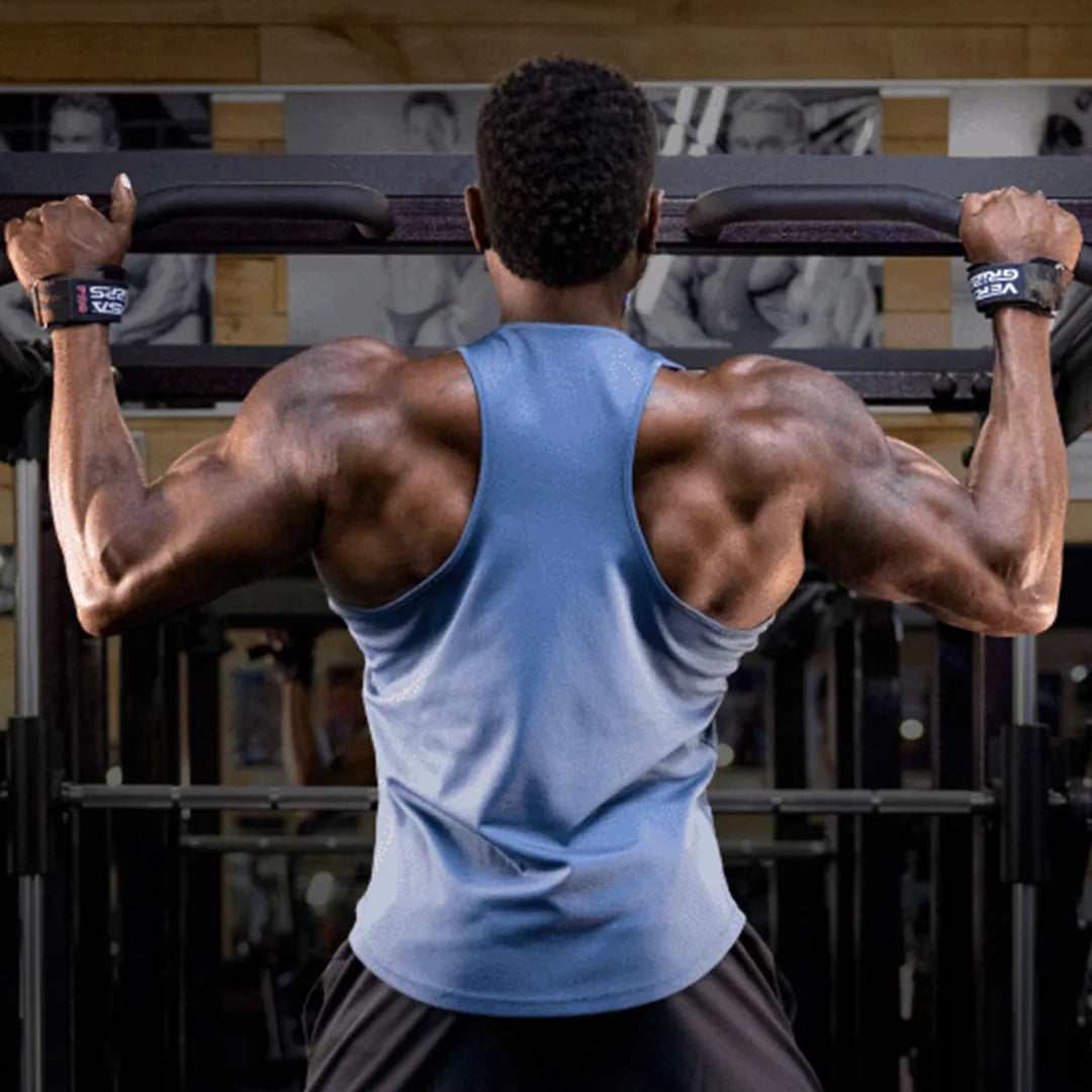 Lifter pulling on a bar wearing Versa Gripps Pro on both wrists